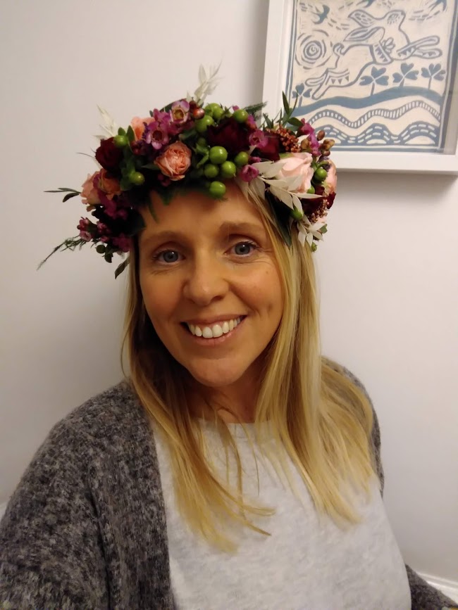 Rach wearing a crown made at a Bude Botanical floral workshop